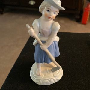 Royal Garden girl hoeing fig